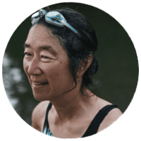 A woman with swimming goggles on