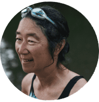 A woman with swimming goggles on